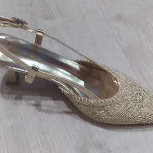 Zapato dorado descubierto