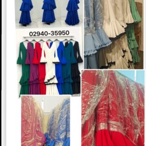 Vestido de flamenca con garrucha y tres volantes.