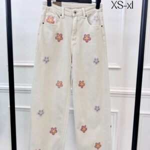 Pantalón vaquero flores colores.