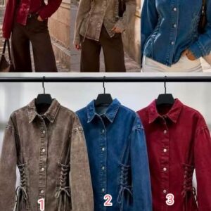 chaqueta vaquera cuerdas al lado .